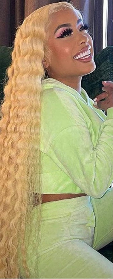 Premium Blonde loose deep wave HD lace wig made with 100% human hair and a seamless lace melt